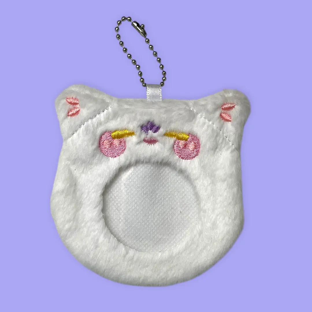 Funda protectora de felpa para botones